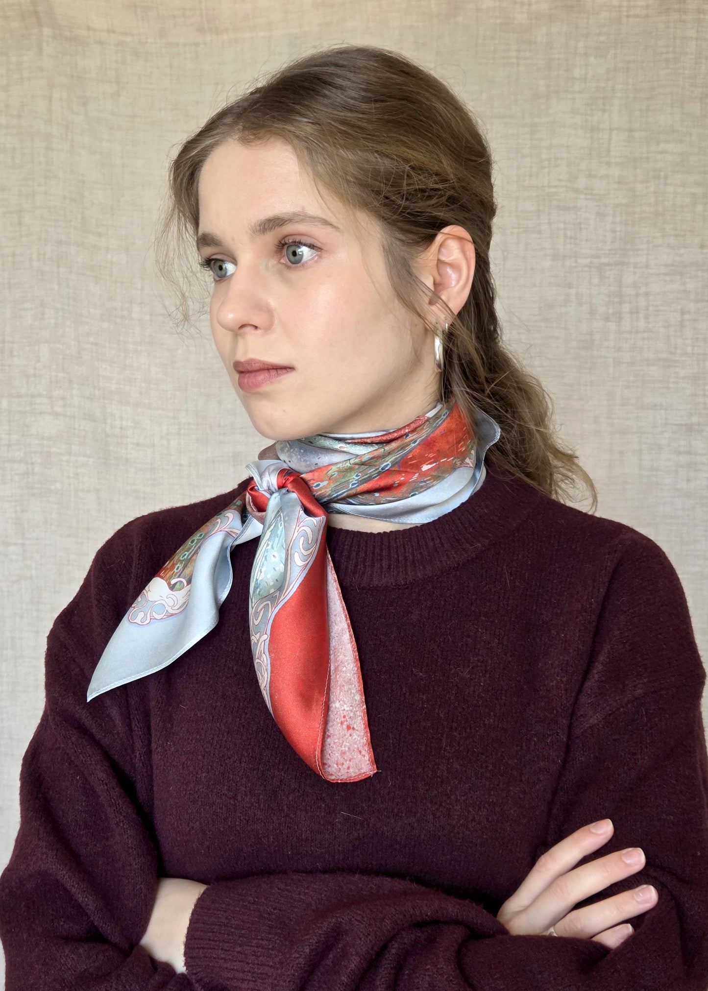 Silk scarf worn around the neck